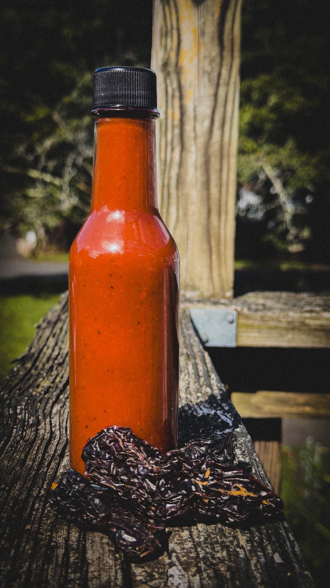 Bottle of Árbol Fire & Smoke hot sauce